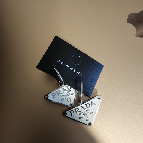 Prada White and Silver Triangle Earrings - Picture 1 of 3